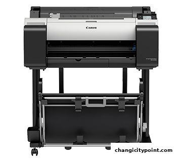 A large, professional Canon printer or copier on a stand with wheels.