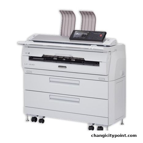 A large, white printer or copier machine with a digital display and paper output trays.