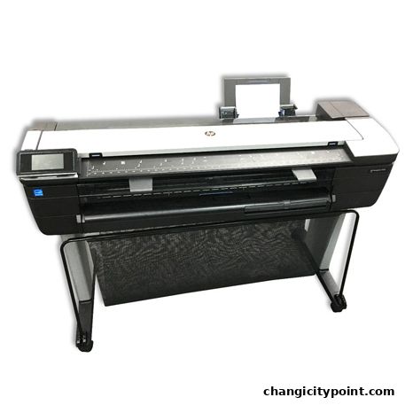 A large format HP printer copier on a stand with a black mesh basket.