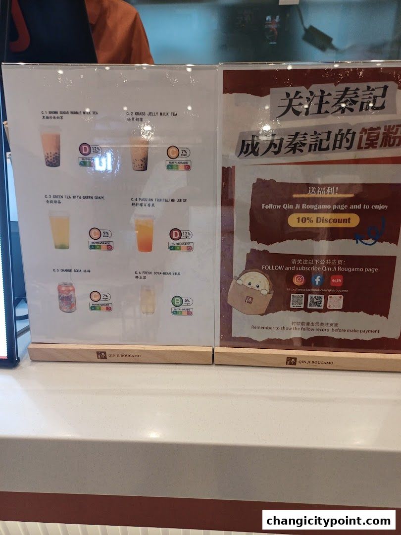 A menu board displaying various drinks with nutritional grades and a discount offer.