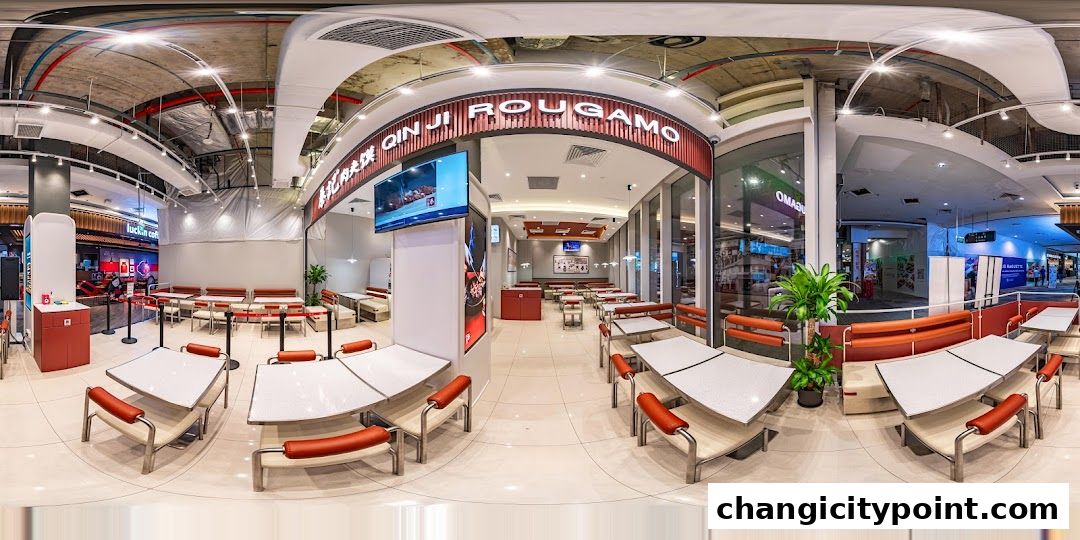 Interior view of Qin Ji Rougamo restaurant with seating and branding visible.