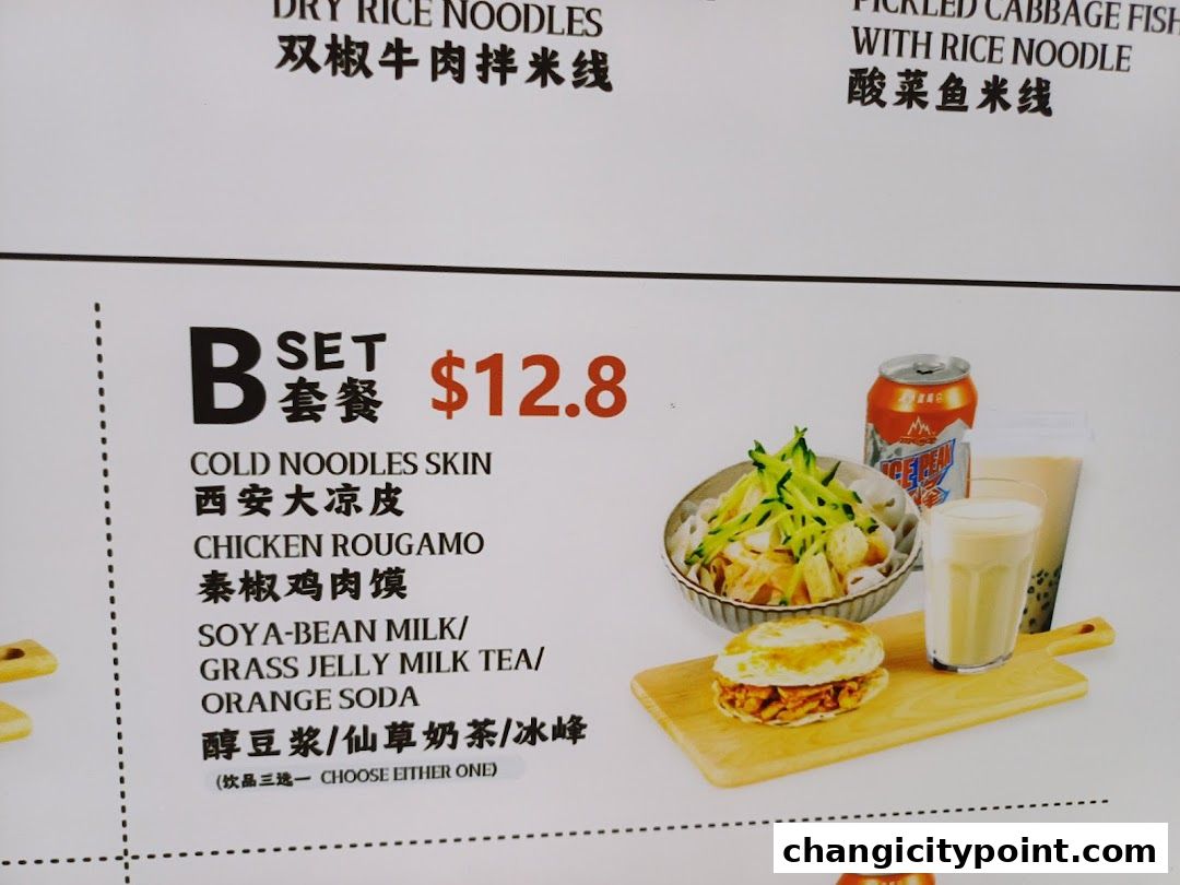 A menu item featuring a set meal with noodles, rouga mo, and a drink choice.