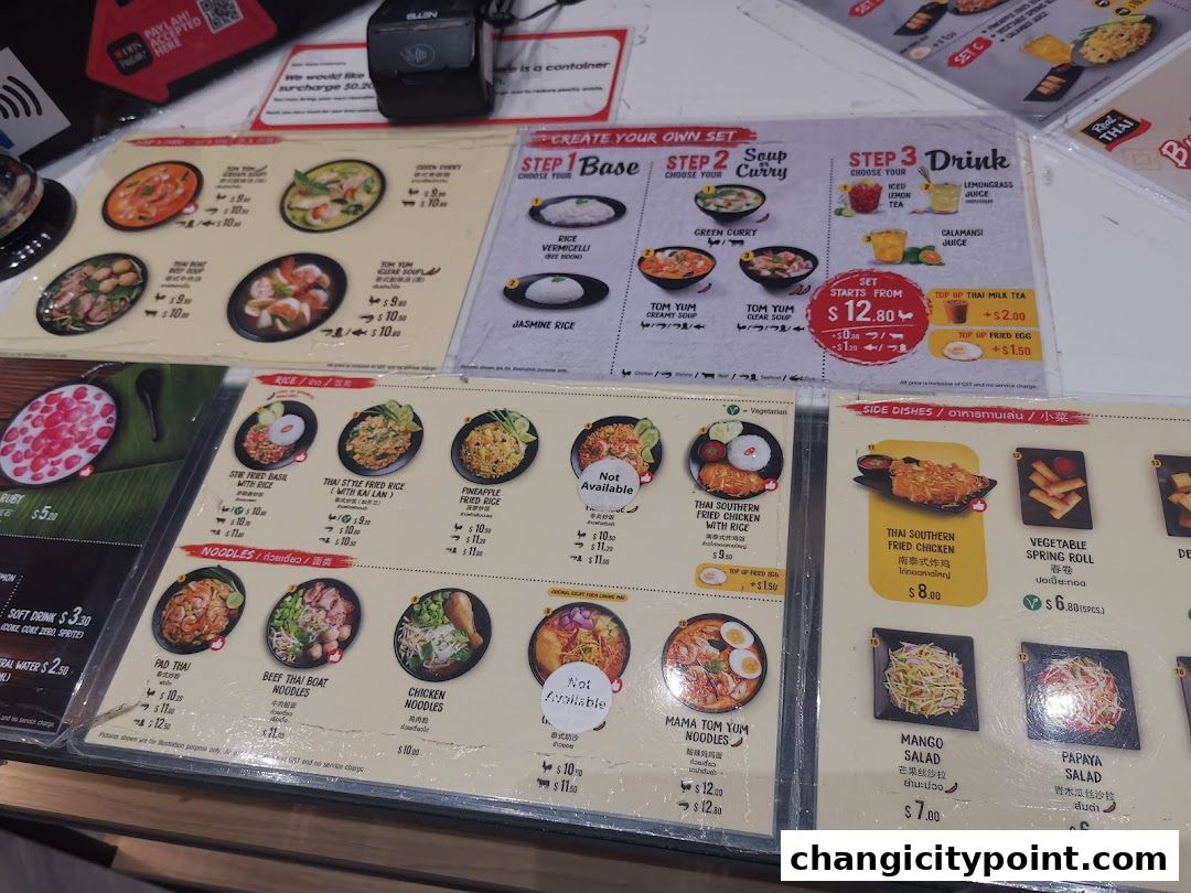 A menu display for Real Thai restaurant featuring various Thai dishes and set meals.