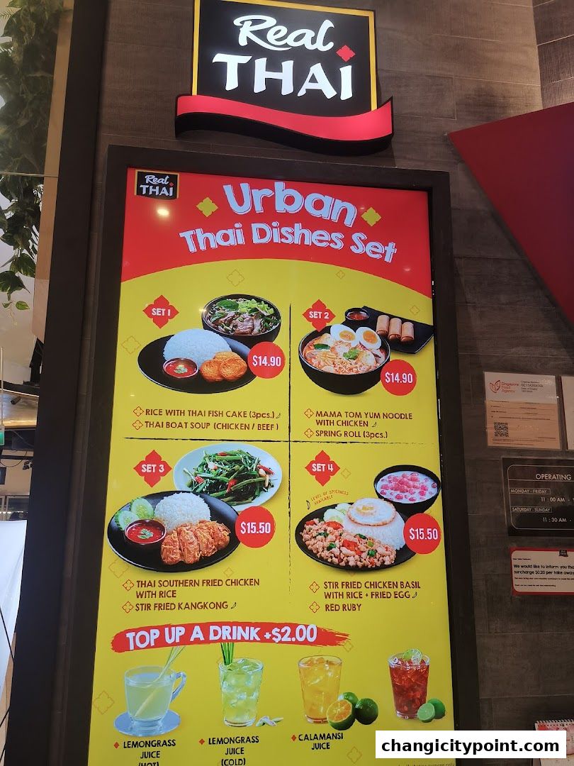 A menu board for Real Thai featuring Urban Thai Dishes Sets and drinks.