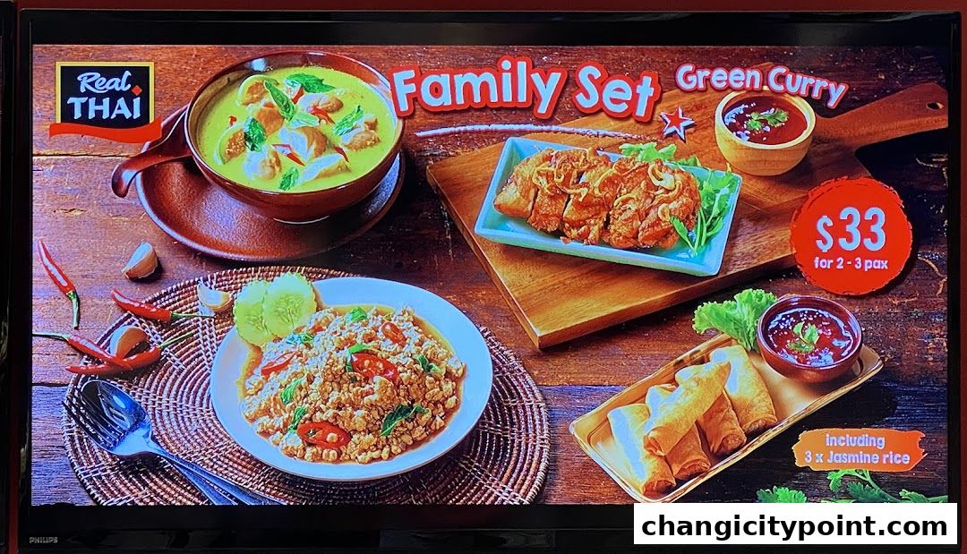 A 'Family Set' menu from Real Thai featuring Green Curry, fried chicken, and spring rolls.