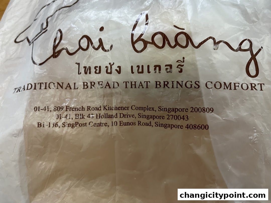 A plastic bag with the Thai Baang logo and addresses printed on it.