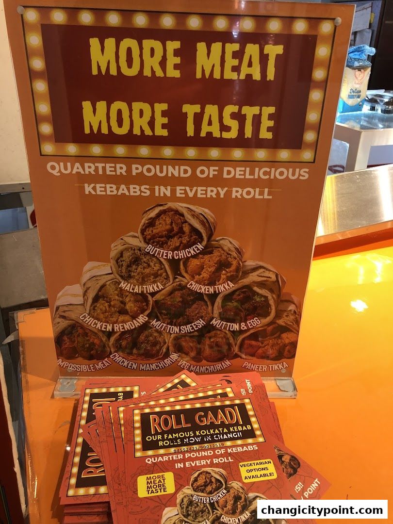 A sign and flyers for Roll Gaadi, advertising quarter-pound kebabs in every roll.
