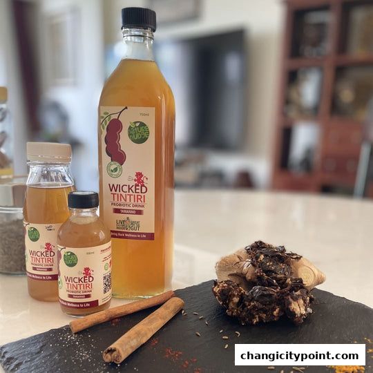 Bottles of Wicked Tintiri probiotic drink with tamarind, ginger, and cinnamon.