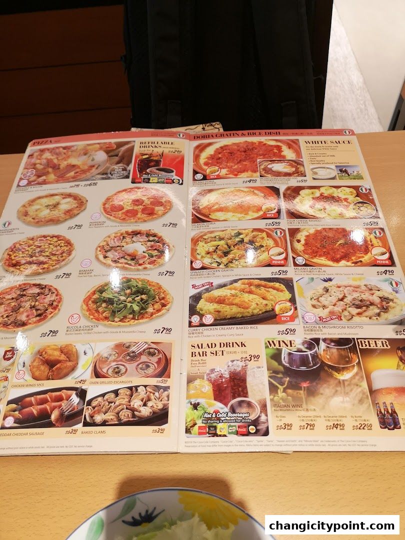 A menu from Saizeriya featuring pizzas, rice dishes, pasta, and drinks.