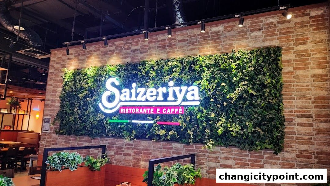 Saizeriya Ristorante e Caffè logo on a brick wall with a green ivy backdrop.