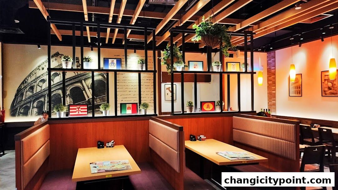Interior of a Saizeriya restaurant with booths, tables, and Italian-themed decor.