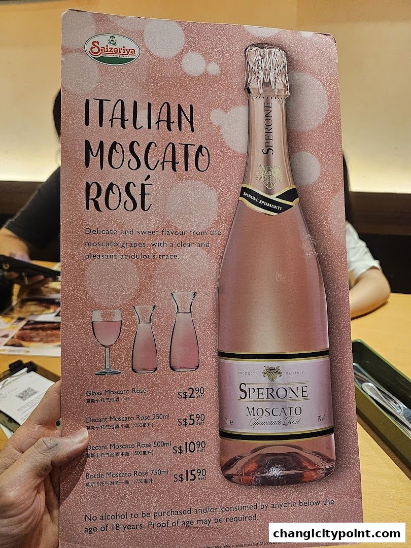 A menu featuring Italian Moscato Rosé with prices for different serving sizes.
