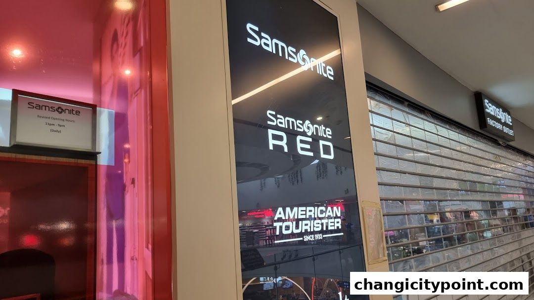 Samsonite Factory Outlet storefront with illuminated signage and closed shutters.