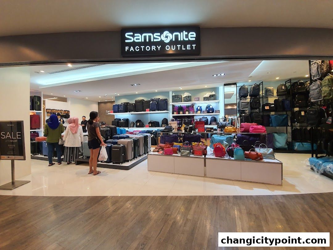 Samsonite Factory Outlet shop displaying luggage, backpacks, and handbags.