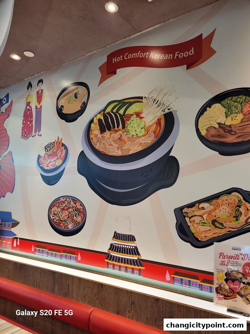 A mural depicting Korean hot pot dishes and traditional Korean figures.