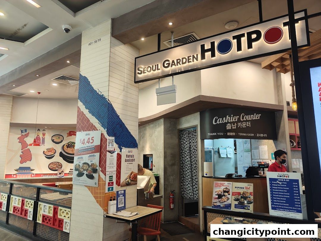 The entrance and cashier counter of Seoul Garden Hot Pot restaurant.