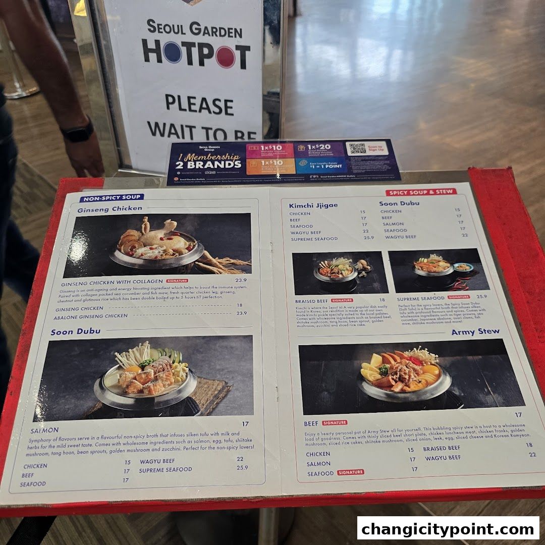 A menu for Seoul Garden Hot Pot featuring spicy and non-spicy soup options.