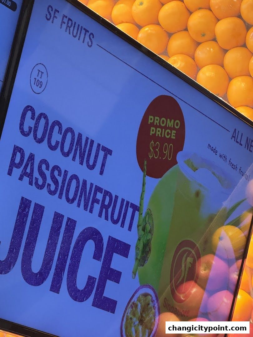 A menu board for SF Fruits showing Coconut Passionfruit Juice with a promo price.