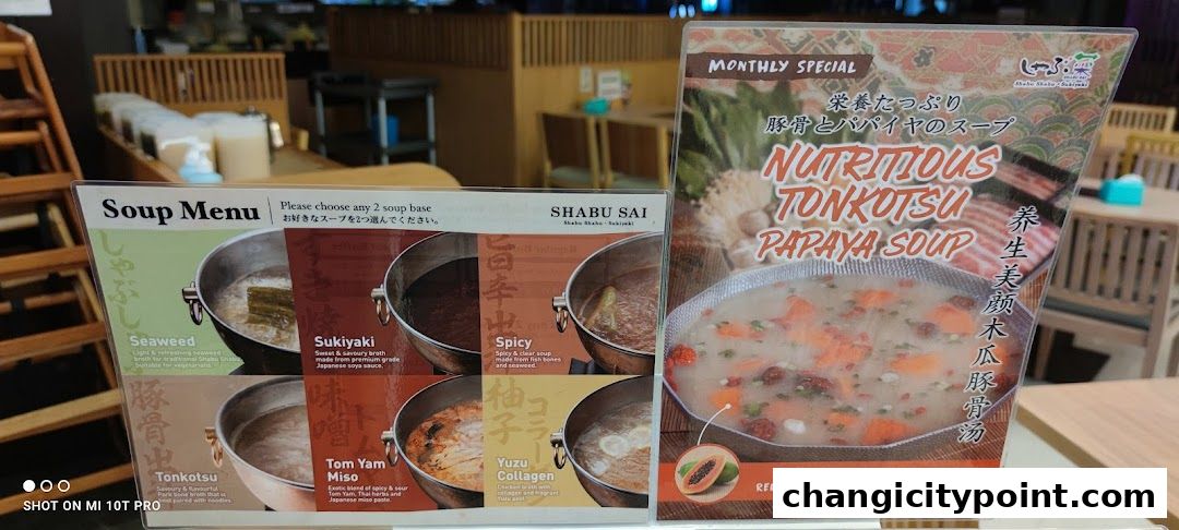 A menu displaying various soup bases for Shabu Sai, including a monthly special.