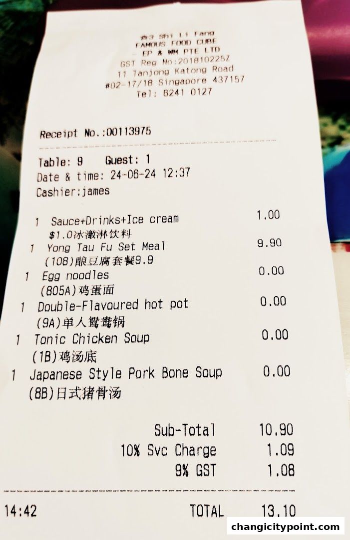A receipt from Shi Li Fang Famous Food Cube showing a hot pot meal and other items.