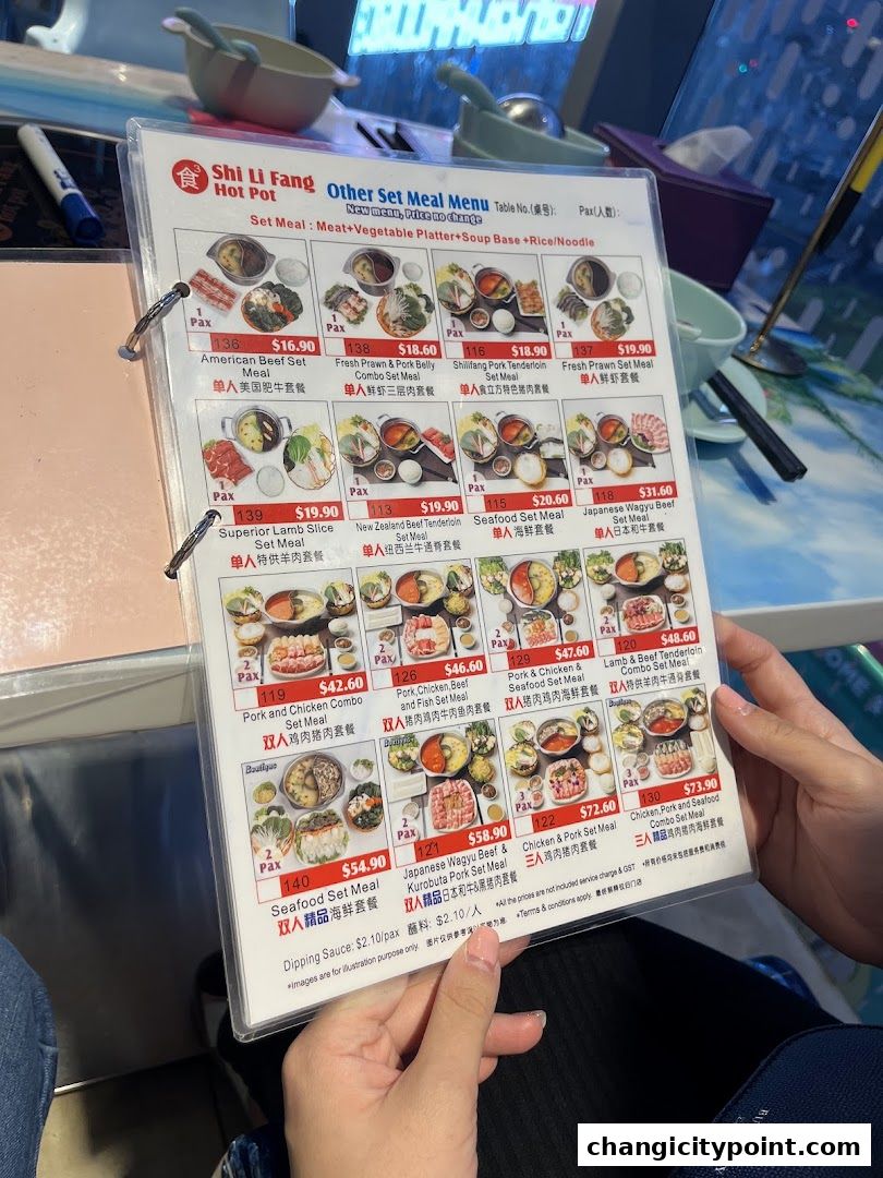 A menu for Shi Li Fang Hot Pot featuring various set meals with prices and images.