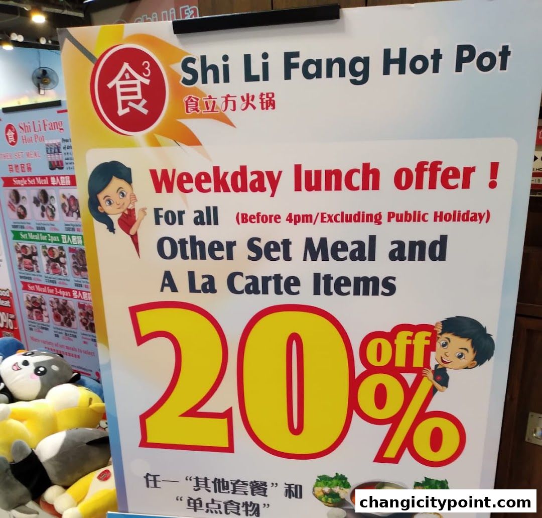 A sign advertising a 20% weekday lunch offer for Shi Li Fang Hot Pot.