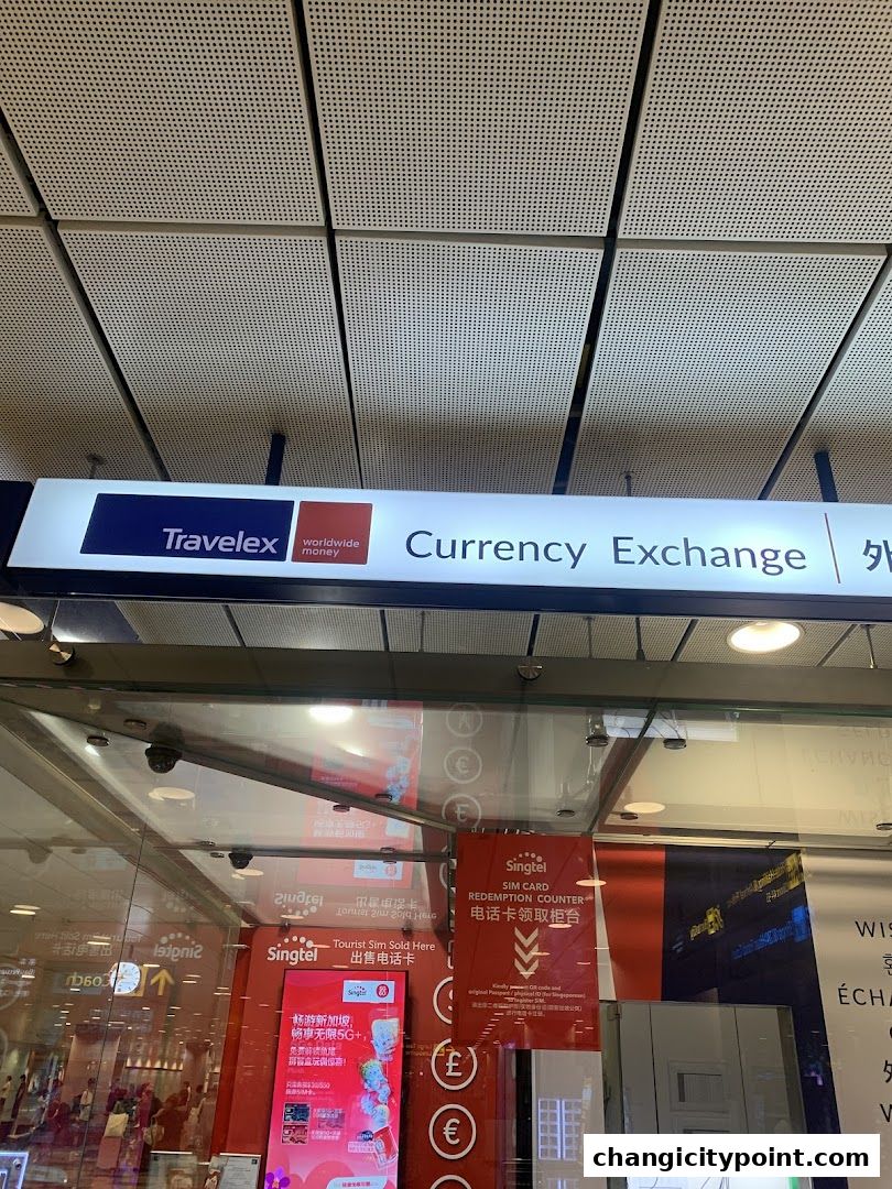 Exterior view of a Singtel and Travelex currency exchange shop.