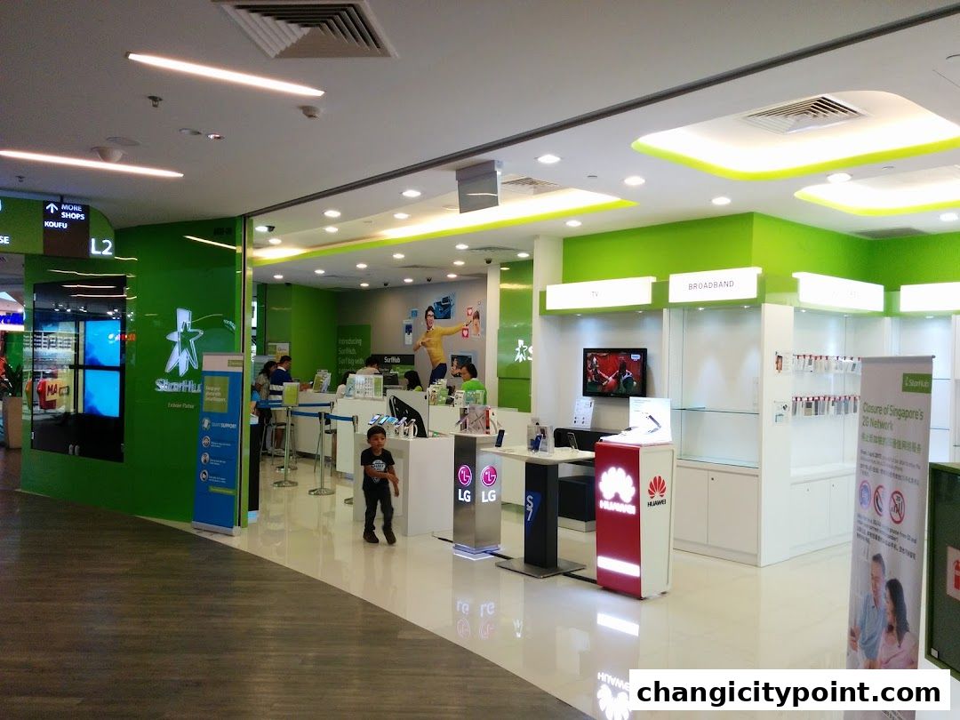Singtel Exclusive Retailer shop front with bright green accents and product displays.
