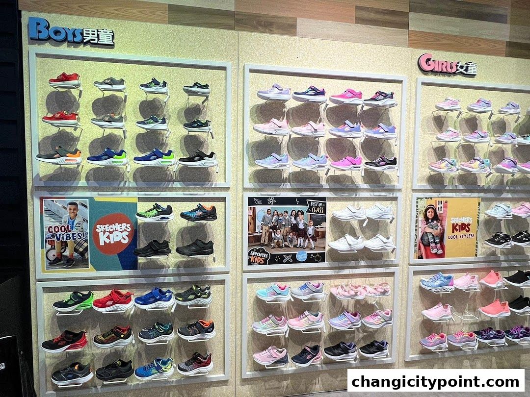 Display of Skechers boys' and girls' shoes, organized by size and style.
