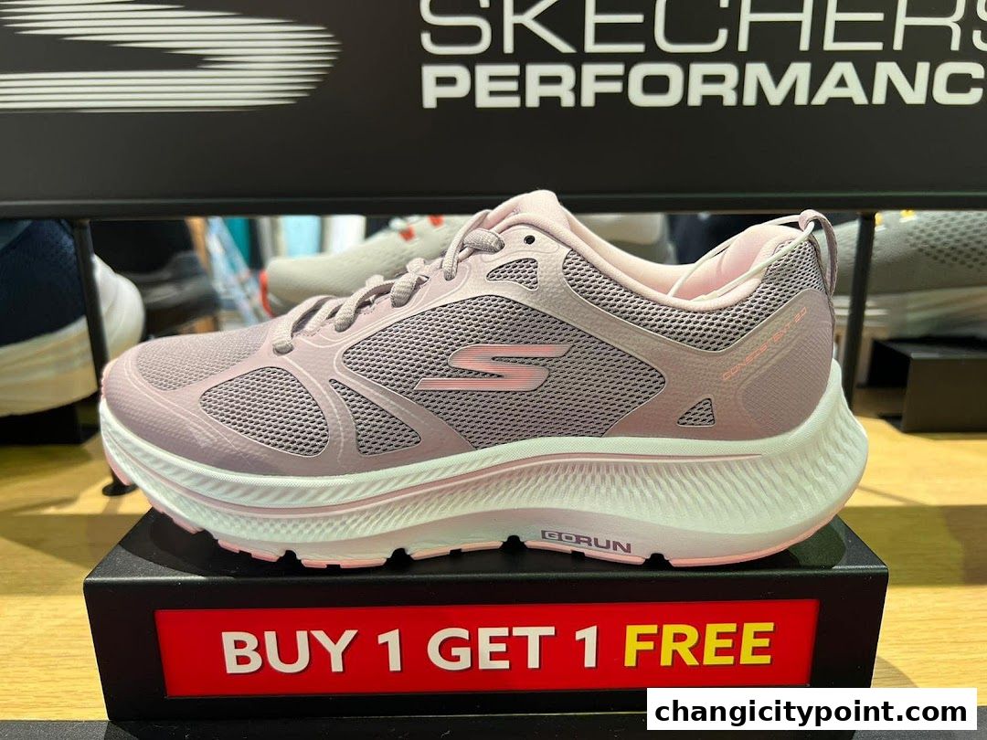 A pink Skechers running shoe displayed with a 'Buy 1 Get 1 Free' offer.