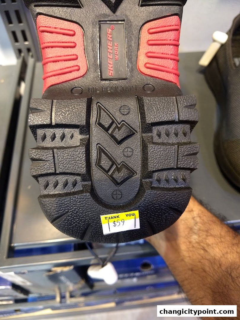 Close-up of a Skechers Work shoe sole with a price tag of $59.