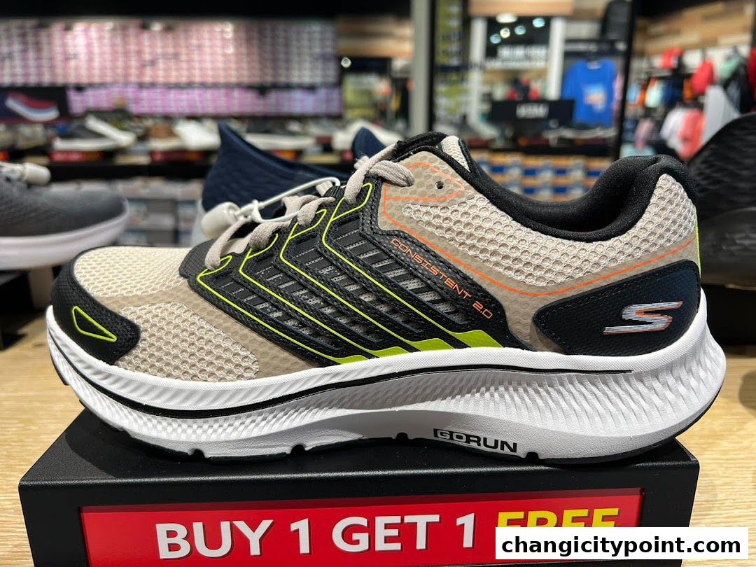 Close-up of a Skechers running shoe with a 'Buy 1 Get 1 Free' offer.