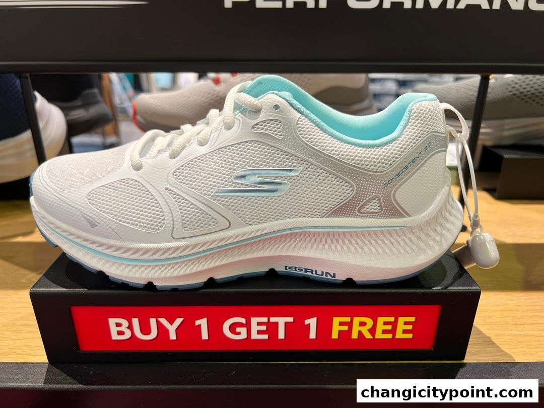 A white Skechers running shoe with a 'Buy 1 Get 1 Free' offer displayed.