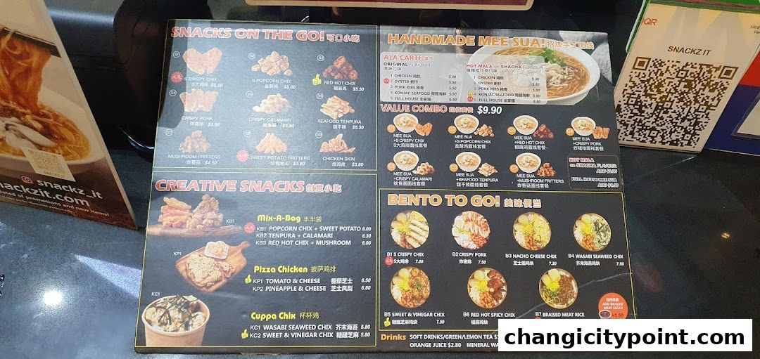 A menu board displaying various snacks, mee sua, and bento boxes with prices.