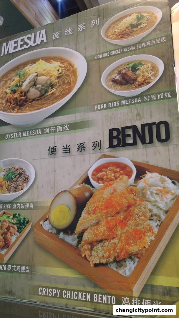 A menu board showcasing various Meesua noodle dishes and Bento boxes.