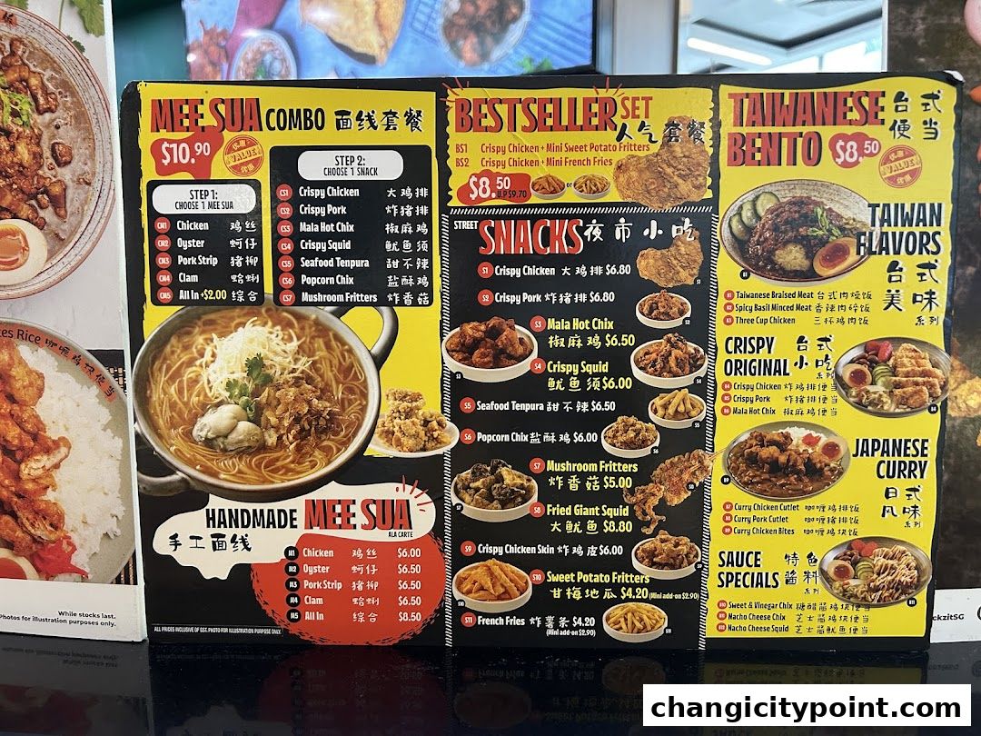 A colorful menu board displaying various snack and meal options from Snackz It!