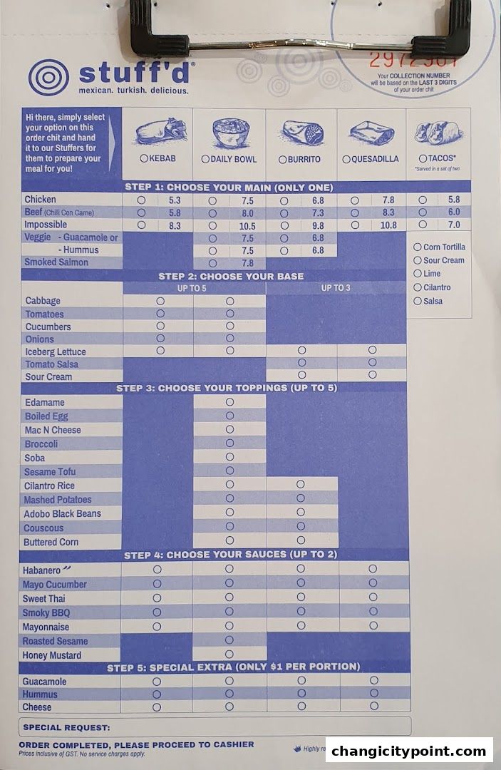 A Stuff'd order form with options for mains, bases, toppings, sauces, and special extras.