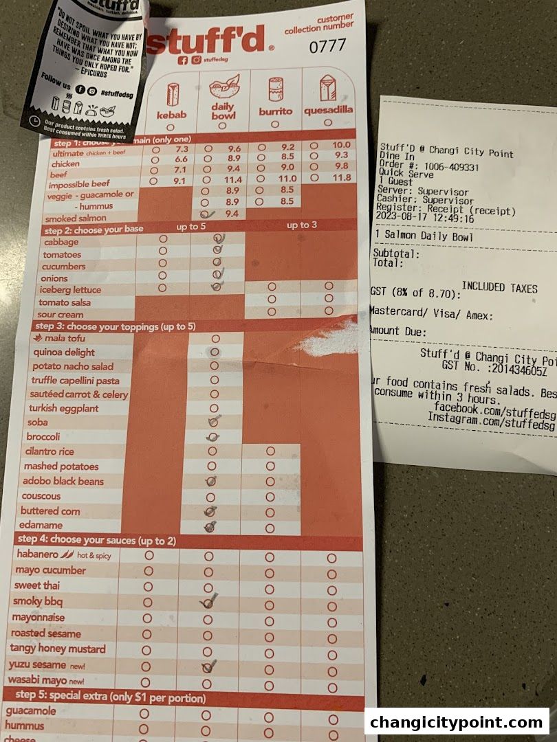 A Stuff'd order form and receipt showing customizable bowl options and a purchased item.