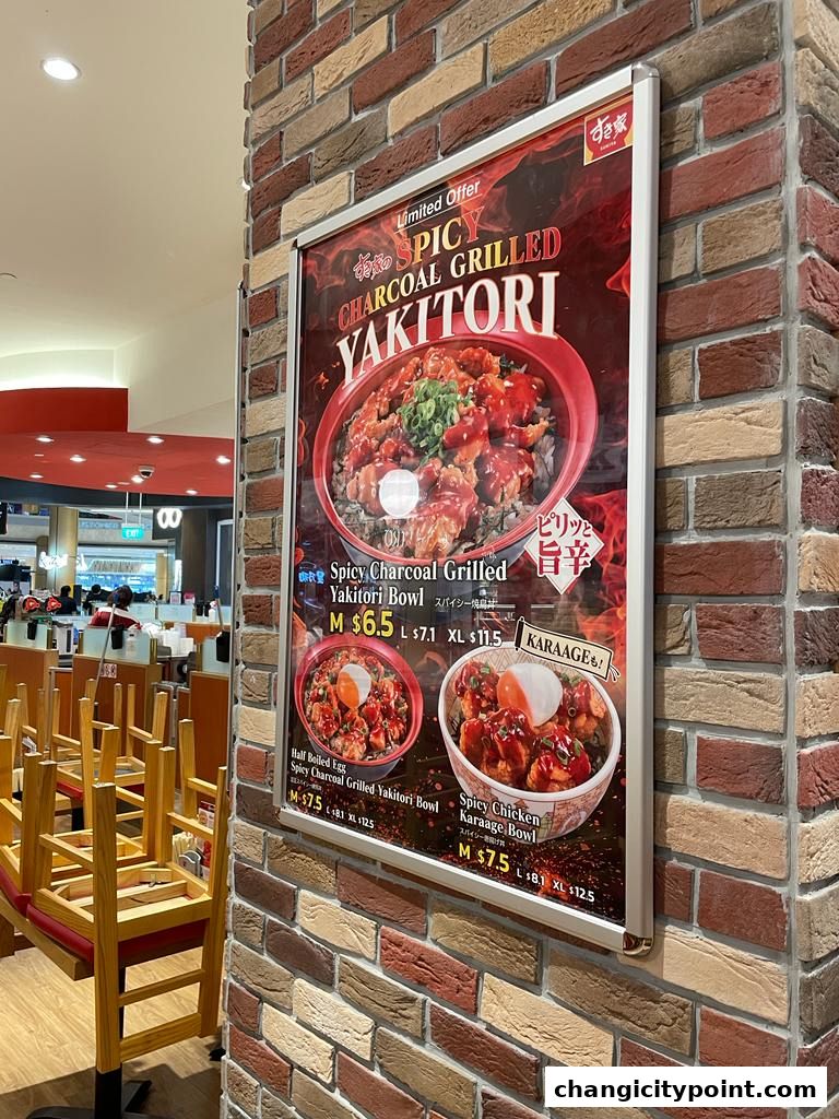 A menu poster for Sukiya featuring spicy charcoal grilled yakitori bowls and karaage bowls.