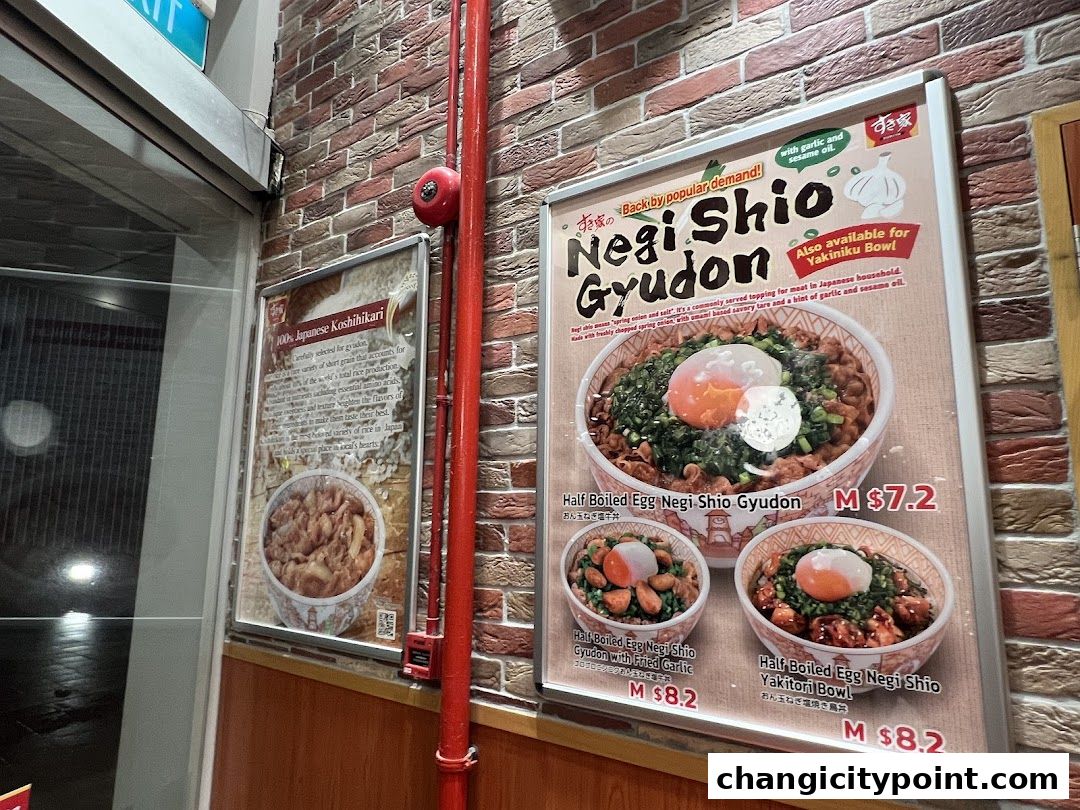 A poster displays Sukiya's Negi Shio Gyudon and other Japanese rice bowl dishes with prices.