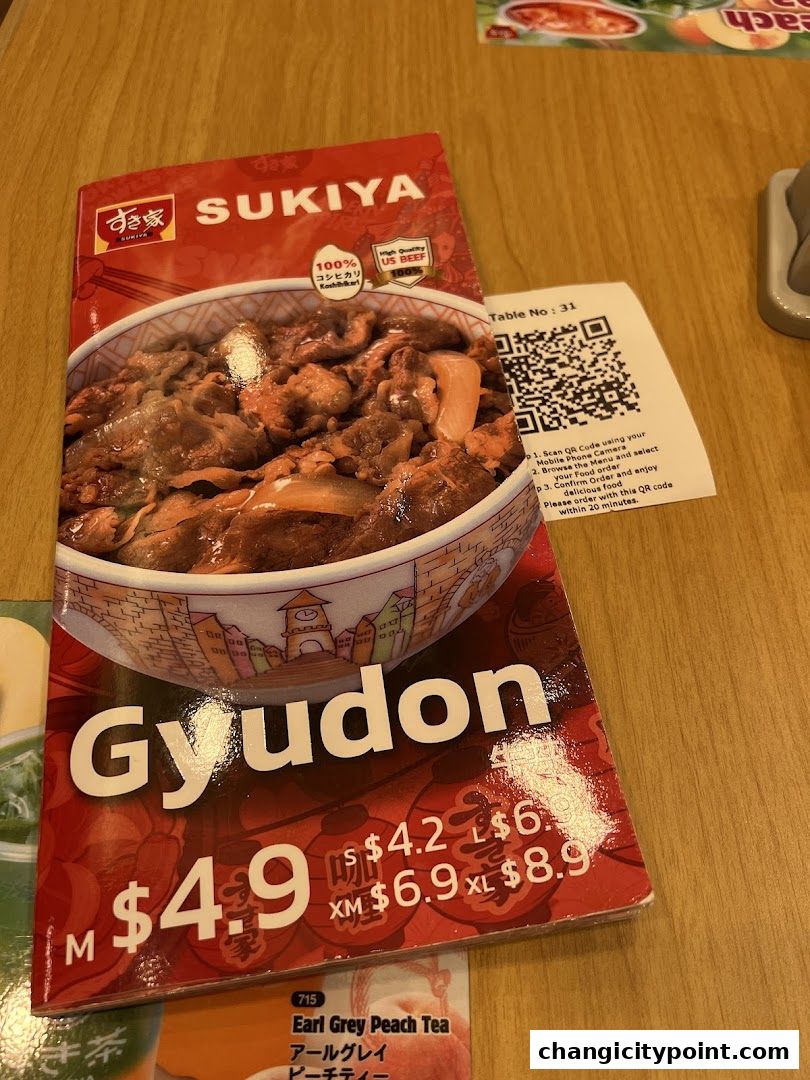 A Sukiya menu featuring Gyudon bowls with various sizes and prices.