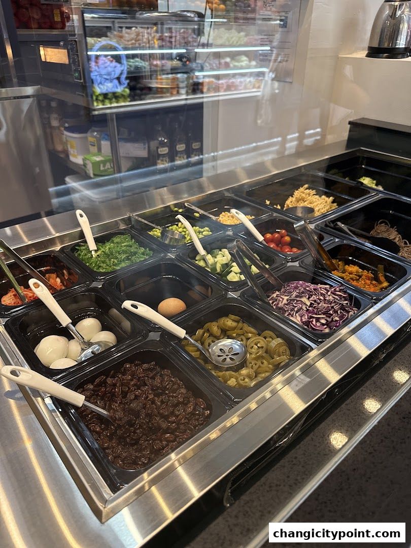A display of fresh ingredients for salads and meals at Supergreen Changi City Point.