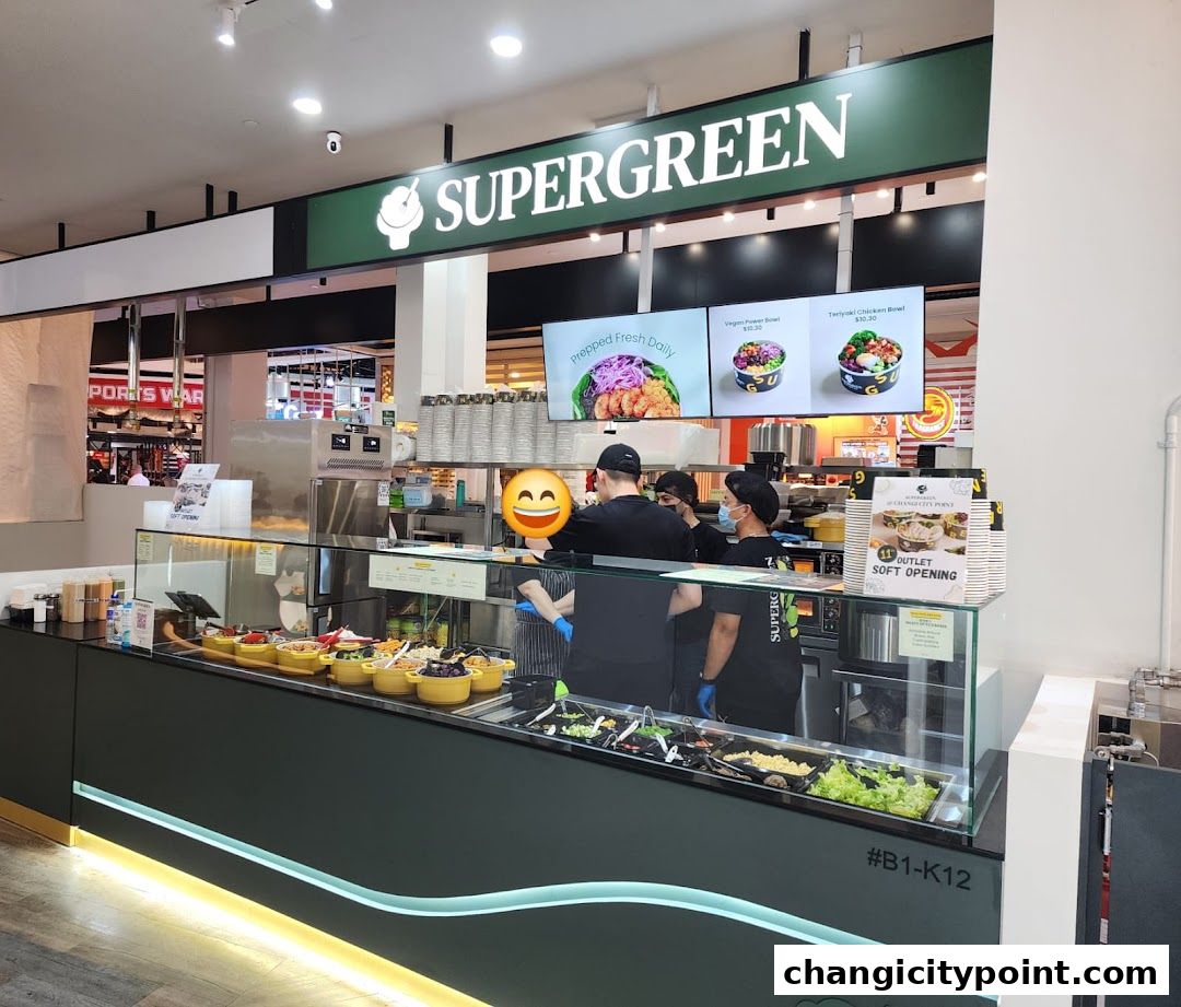 Supergreen shop front with fresh food bowls and staff preparing orders.