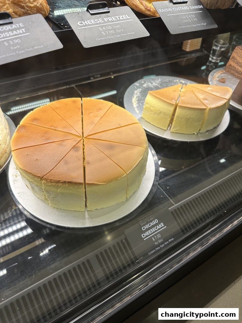 A display case filled with delicious cheesecakes and pastries at The Coffee Bean & Tea Leaf.