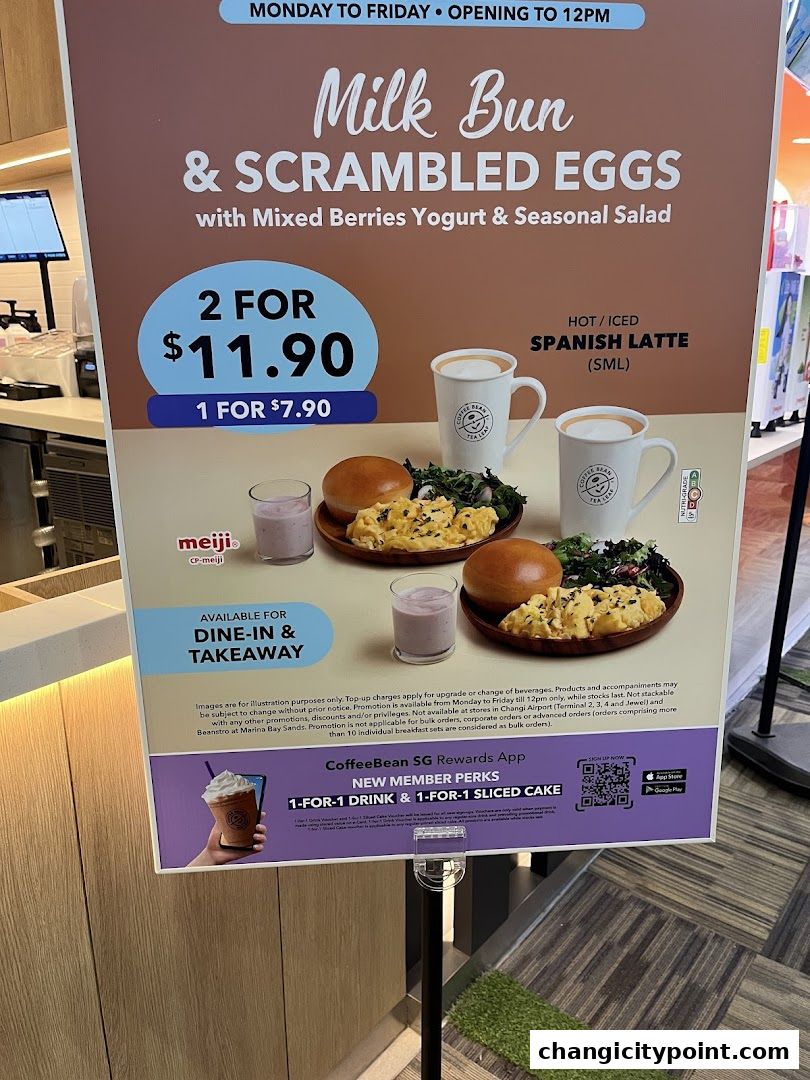 A promotional sign for The Coffee Bean & Tea Leaf featuring a breakfast set and latte deal.