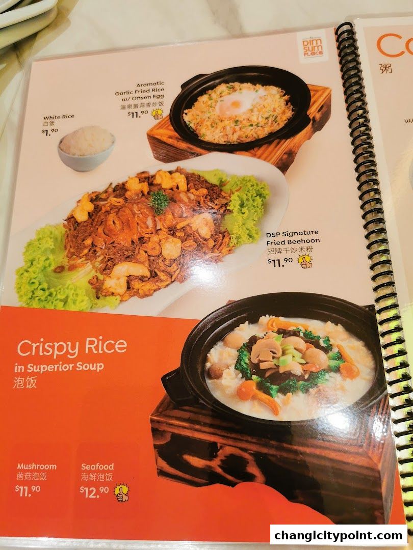 A menu page from The Dim Sum Place featuring various rice and noodle dishes with prices.