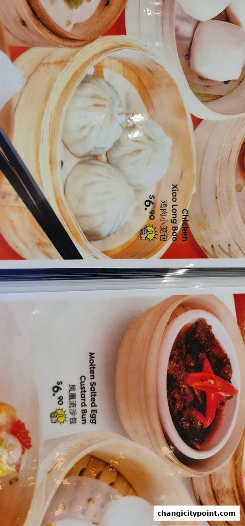 A menu featuring dim sum items like Xiao Long Bao and Molten Salted Egg Custard Bun.