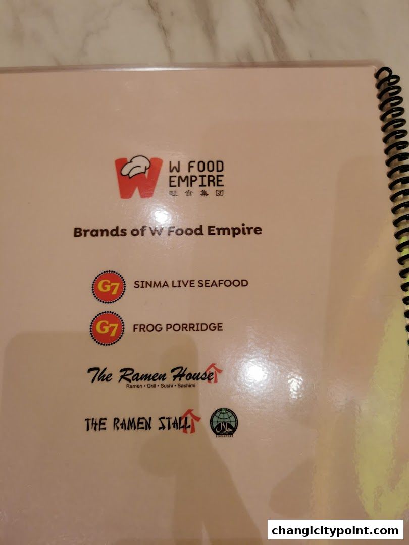 A menu page showcasing brands under W Food Empire, including seafood, frog porridge, and ramen.