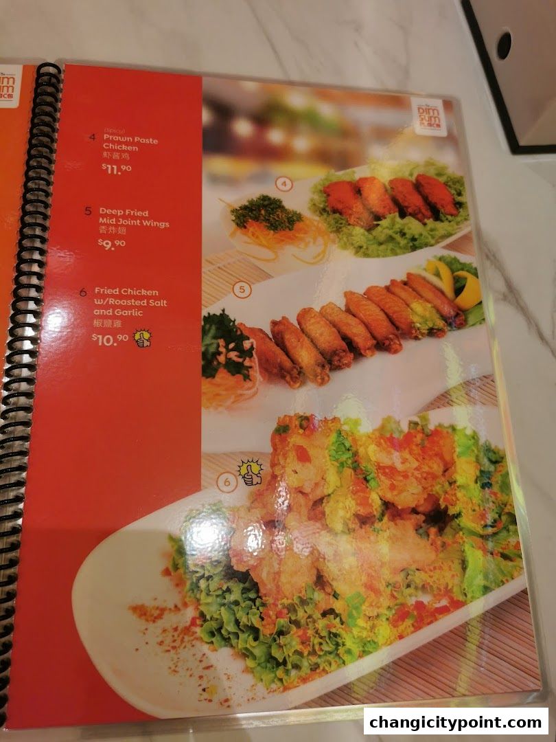 A menu page from The Dim Sum Place featuring prawn paste chicken, deep-fried wings, and fried chicken.