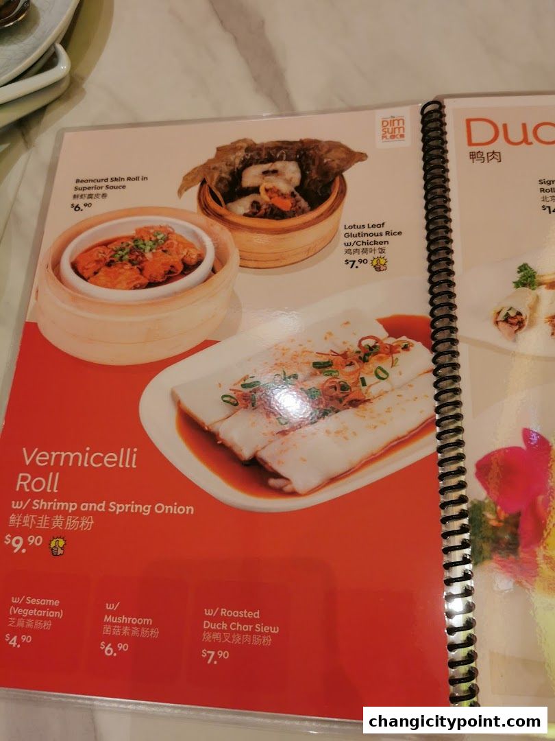 A menu page from The Dim Sum Place featuring various dim sum dishes with prices.